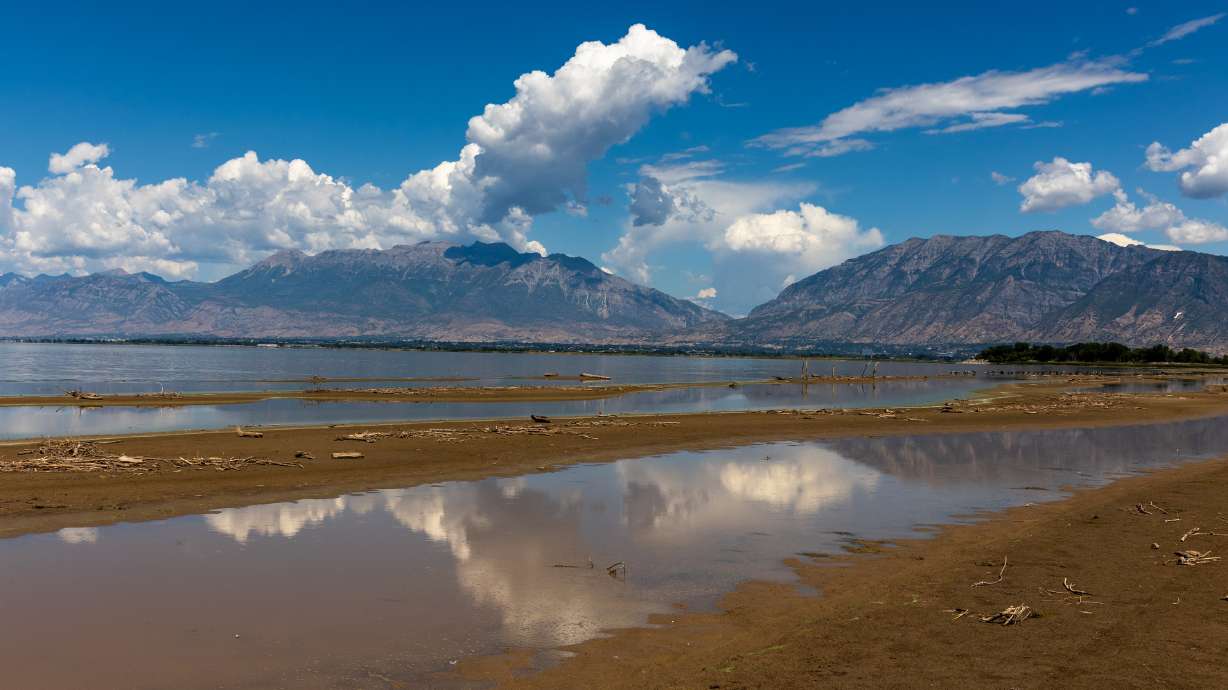 Utah Lake and Sandy Beach in Spanish Fork are pictured on  Aug. 22, 2022. Controlled releases are set to begin at Utah Lake as it reaches maximum capacity, which is expected to benefit the Great Salt Lake. Utah Lake and Sandy Beach in Spanish Fork are pictured on Aug. 22, 2022. Controlled releases are set to begin at Utah Lake as it reaches maximum capacity, which is expected to benefit the Great Salt Lake. (Ben B. Braun, Deseret News) 